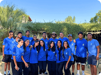 Team in matching blue C-Trips shirts